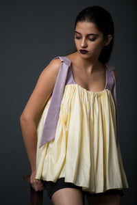 Liberta - Frilled top with faux suede straps