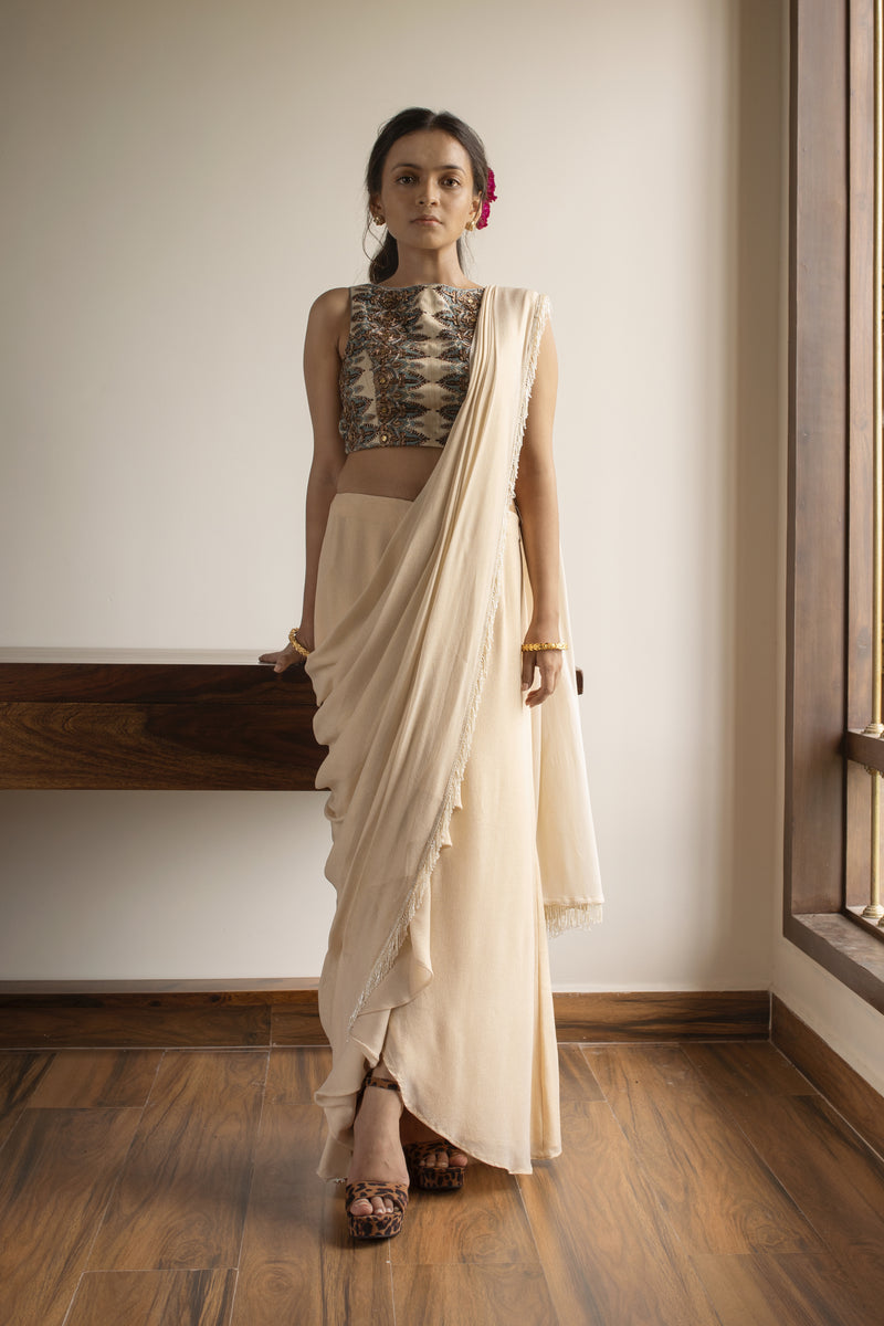 Trendy Indo western Jumpsuits and Drape Sarees for Indian weddings.